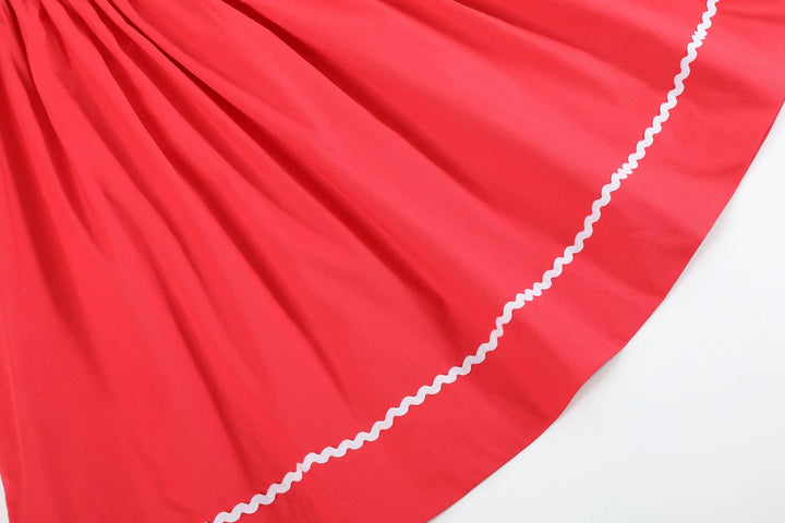 Red Santa Sleigh Smocked Bishop Dress